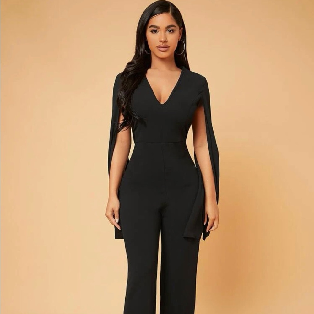Brand new. Black jumpsuit